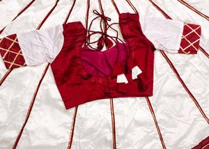 Maroon &amp; white lehenga choli.