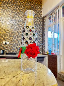 Crystallized designer plastic bottle