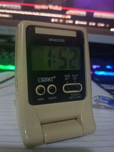 Portable Desk Clock Foldable With Alarm Facility.