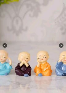 Pack Of 4 Monk Showpiece