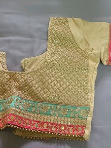 EMBELLISHED SILK LEHENGA IN PINK GREEN AND GOLDEN