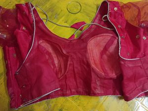 Readymade Saree Blouse In Tomato Red Color With Golden Work (Sequence Pasted) With Net sleeves ,good To Fit 40 To 42 Size Breast.