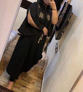 Embellished Black Dress with Attached Jacket