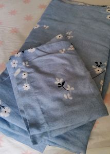 2 sets of premium curtains( 4 pieces) and one queen size bedsheet