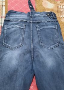Ripped Blue Denim Jeans