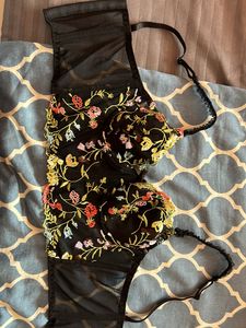 Elegant embroidered net corset.