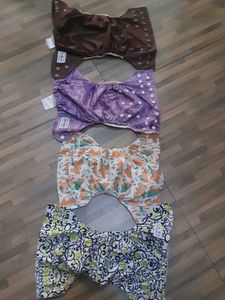 Cloth Diaper Lot of 4 Plus 7 Inserts Free