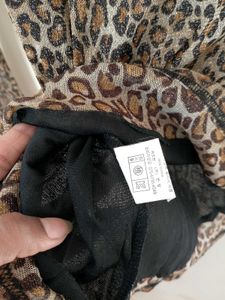 leopard print turtle neck mesh top.