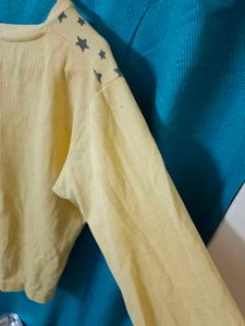 A Yellow Full Sleeved Winter Wear Sweatshirt