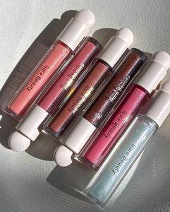 RARE BEAUTY LIP GLOSS
