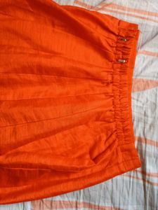 Ethnic Orange Skirt/ Lehenga With Golden Border
