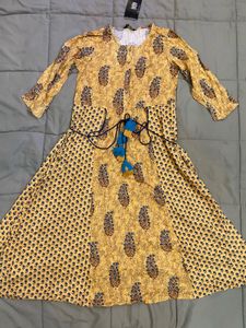 INDYA Mustard Printed Side-Tie A-Line Kurta