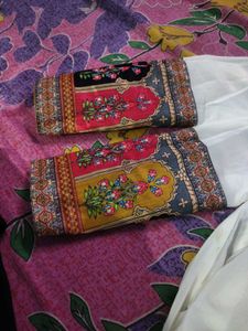 white gawn and colorfull duppata