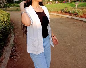 White Shrug And Black Top