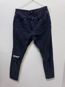 Distressed black jeans