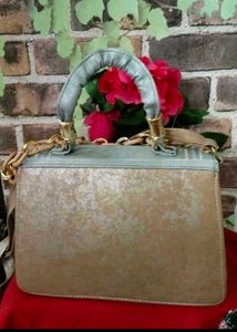 Magnifique Handbag