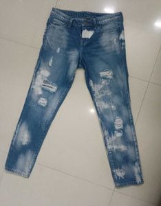DKNY Ripped Jeans.