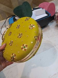 Mustard round Embroidered Clutch