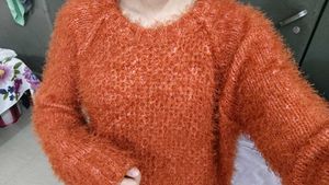 orange fury sweater