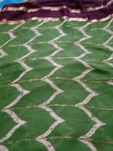 Green,Georgette With Maroon Border.