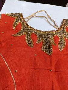 Orange Colour Blouse With Sleeves Inside...