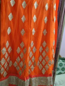 Orange Net Unstitched Lehenga For Women