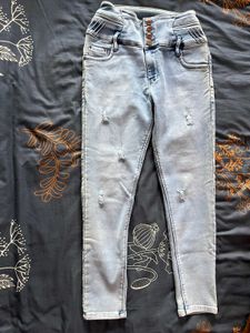 Ripped Light Wash Denim Jeans