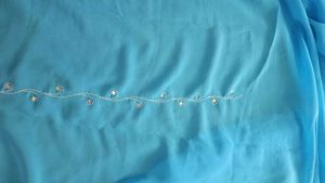A Sky Blue Georgette Sequins Saree
