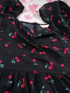 black floral sweetheart neck dress
