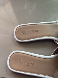 Elegant White Slip-On Sandals by Tokyo Talkies