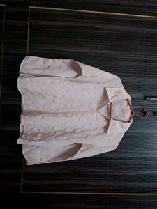 Pink chiffon shirt.