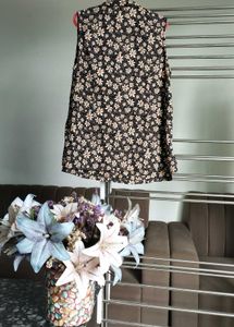 Floral Sleeveless Button-Up