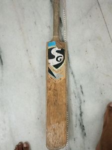 REAL WOODEN SG BAT IN OK CONDITION WITH 2 TENNIS BALL FREE READ DESCRIPTION FOR MORE INFORMATION