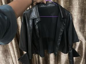 Elbow cut leather jacket.