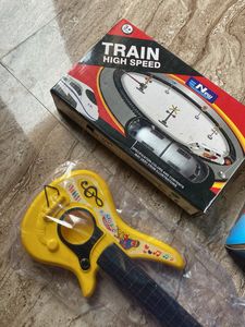 Mixed Toy Bundle - Train Set, Guitar, &amp; More!