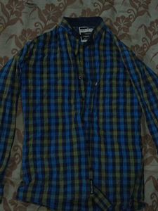 Blue and green plaid shirt