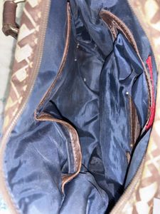 Tommy Hilfiger monogram handbag in brown and tan