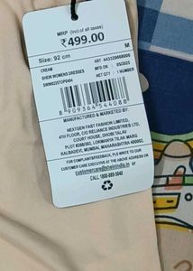 Peach Tank Top with Floral Detail