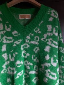 Green Jumper with White Accents