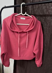 pink cropped length hoodie