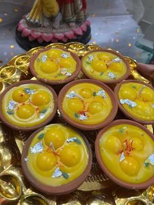 Festive Glow with 2 Rasmalai Candles in Every Box