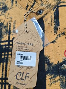 2 KIDS SHIRT OF SIZE 32(AGE9-11)