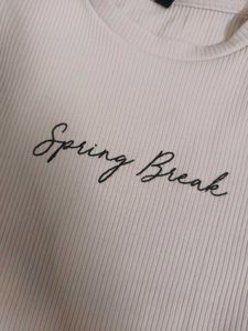 pink typography (knitted) top.