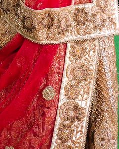 Bridal lehenga golden and Red with heavy work