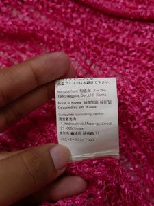 Pink crochet shrug