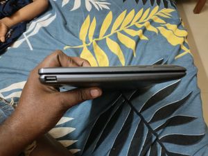 Asus mini windows touch laptop bacome Tab