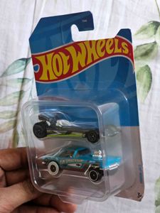 Two Hot Wheels cars, factory-sealed and brand new