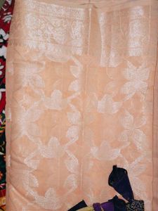 Crossandra saree with purple heavy blouse