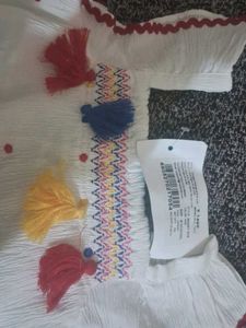 White Dress with Colorful Details