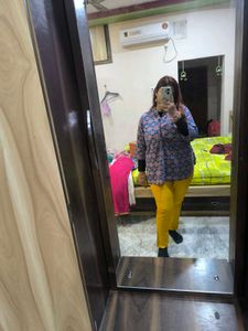 Mustard yellow churidar pant.